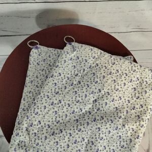 Never used. "Evelyn Jacobs" ( my mom) homemade pot holders for looks